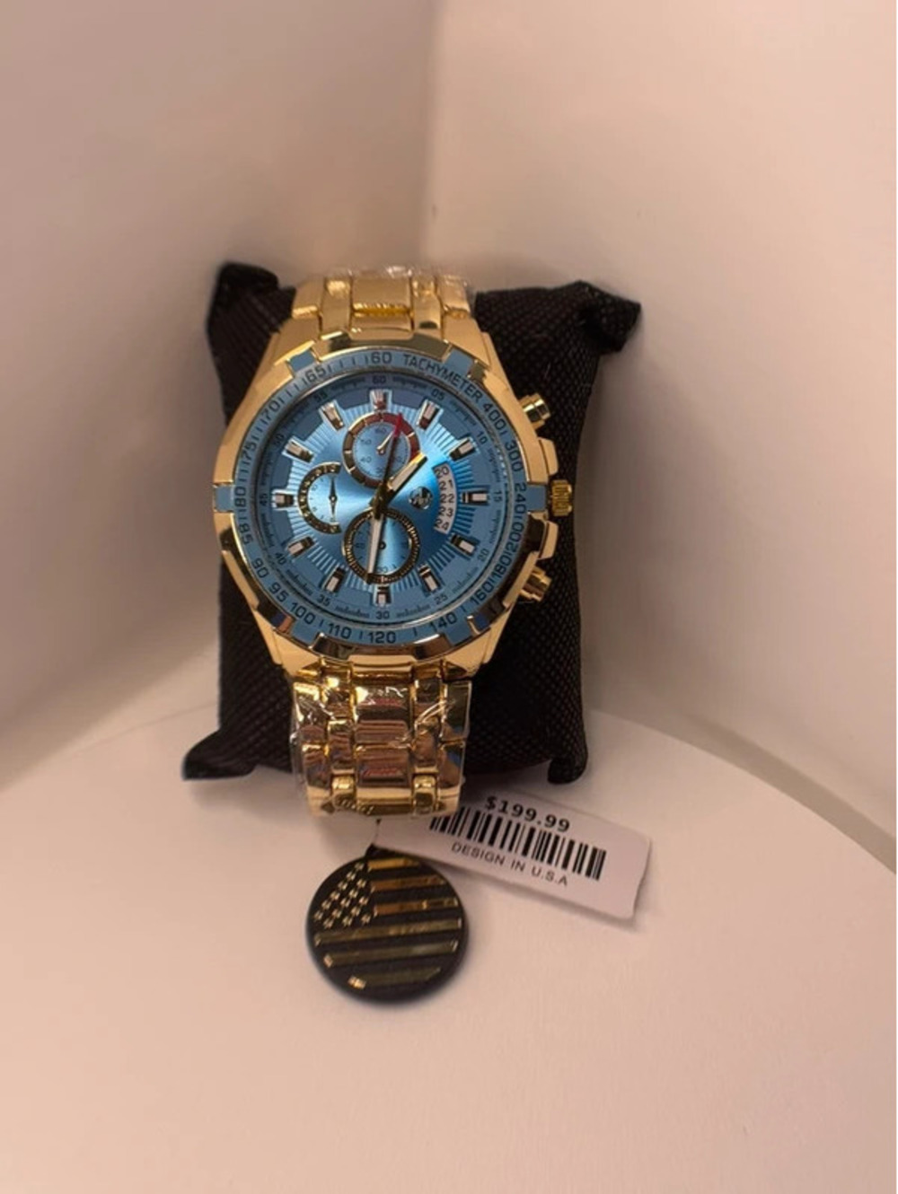 AJ heavy stainless steel, gold tone, blue face Sports Master
